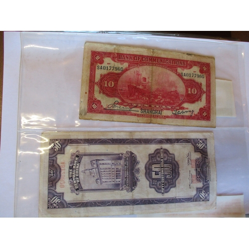 469 - World collection in album many countries represented with Taiwan, Ireland 1975 £1 extremely fine, Ch... 