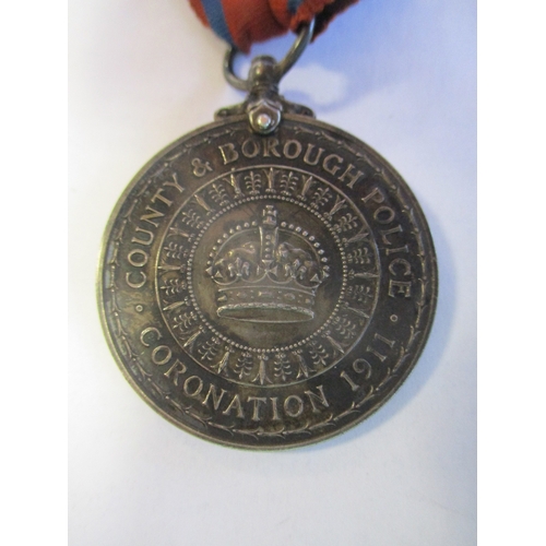 66 - Unusual 1911 County & Borough Police Coronation Medal, edge engraved 