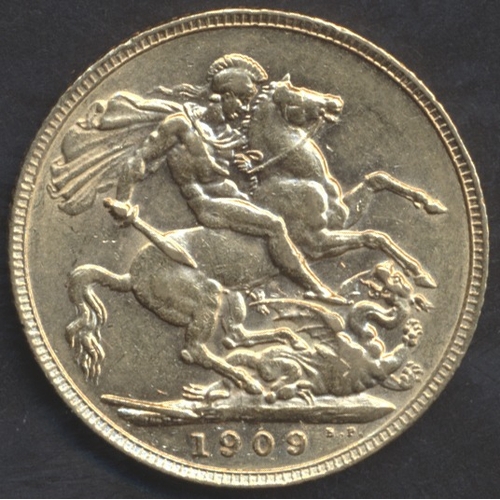 677 - Investment Gold Lot – documents required. 1909 sovereign near extremely fine. (Y)