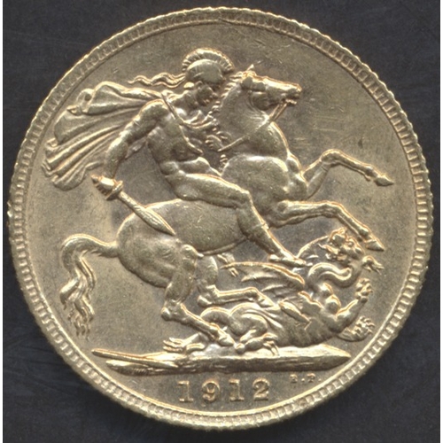 693 - Investment Gold Lot – documents required. 1912 sovereign near extremely fine. (Y)