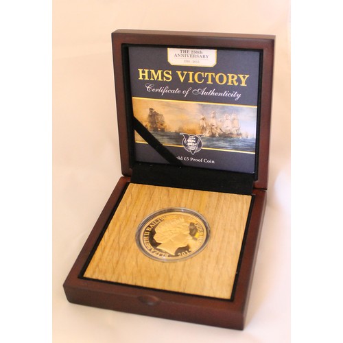 833 - Investment Gold Lot – documents required. Guernsey. 2015 £5 HMS Victory proof FDC in wooden presenta... 