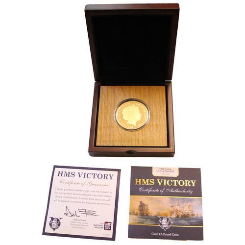 833 - Investment Gold Lot – documents required. Guernsey. 2015 £5 HMS Victory proof FDC in wooden presenta... 