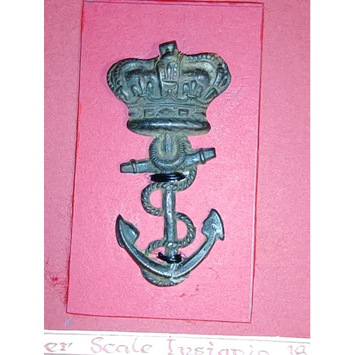 244 - Royal Marines badge relics wire mounted on board for display with pouch badge (1802-15), shoulder sc... 