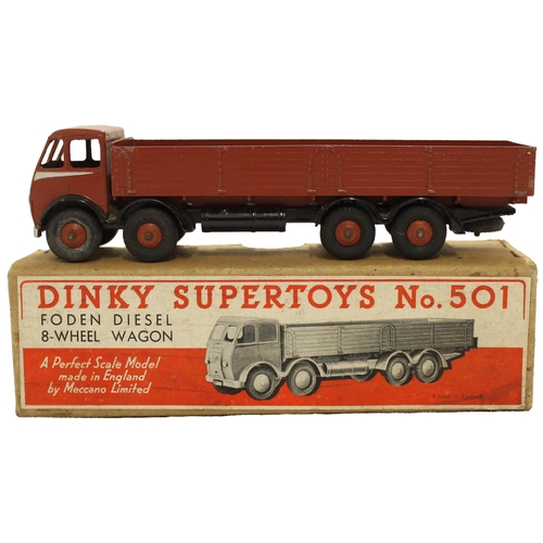 312 - Dinky. 501 Foden Diesel 8-wheel Wagon, 1st type cab, chocolate brown cab, back and hubs, silver flas... 