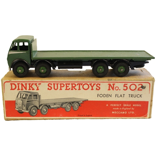 314 - Dinky. Supertoys 502 Foden Flat Truck, dark green cab and back, silver flash, black chassis, dark gr... 