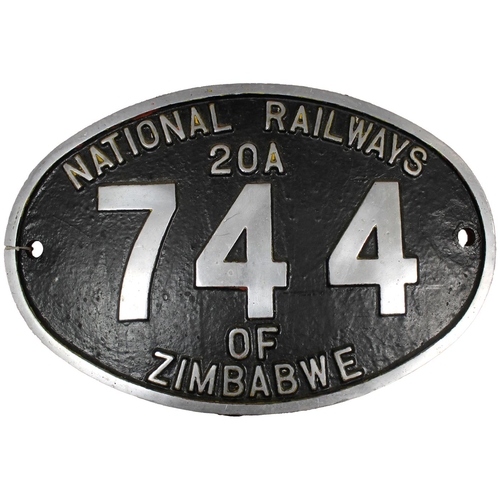 372 - Railwayana. 'NATIONAL RAILWAYS/ 20A/ 744/ OF/ ZIMBABWE' black/ gold oval metal cab side number plate... 