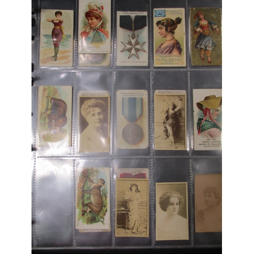 18 - Collection of odds in album including Ogdens Guinea Golds animals, figures of interest, sports, tabs... 