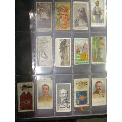 18 - Collection of odds in album including Ogdens Guinea Golds animals, figures of interest, sports, tabs... 