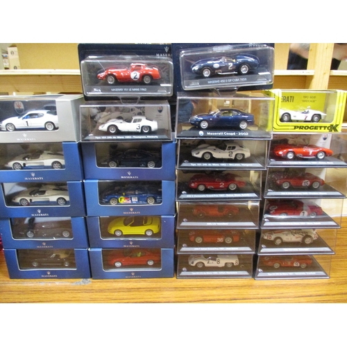 239 - Collection of Maserati's in plastic display cases, some carded generally mint in mint boxes. Qty 24 ... 