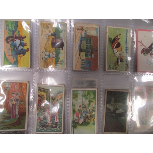 31 - East Asia collection in plastic sleeves including odds from BAT strange stories, Chinese girls (B), ... 