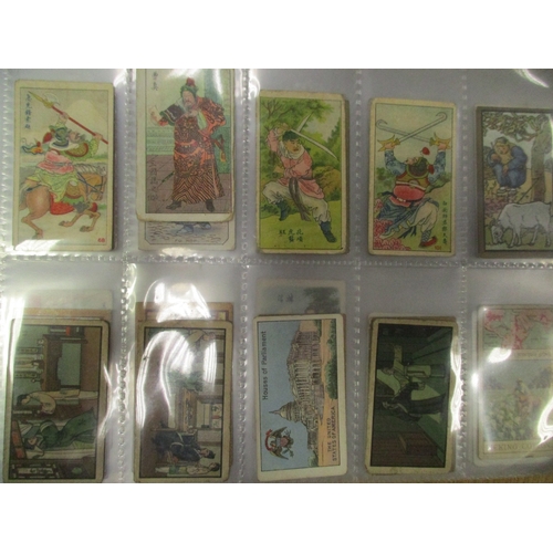 31 - East Asia collection in plastic sleeves including odds from BAT strange stories, Chinese girls (B), ... 