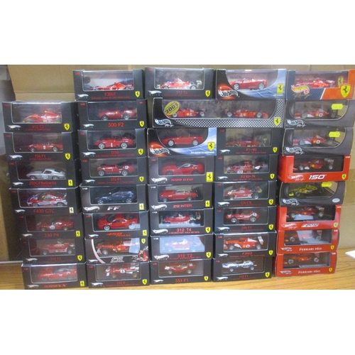 324 - Hot Wheels. Range of Ferrari racing and Formula 1 cars, produced by Ixo and Mattel, generally mint i... 