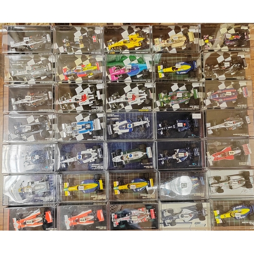 340 - Minichamps. Collection of F1 cars generally mint in very good to near mint plastic display cases. Qt... 