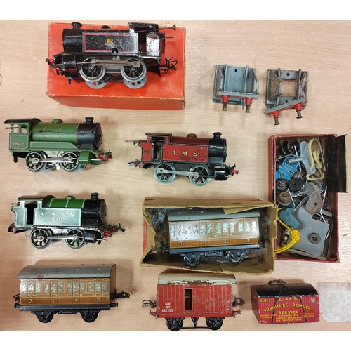 391 - Hornby. Collection of O gauge generally good in fair to good boxes with clockwork tank locomotive No... 