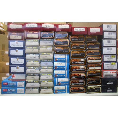 403 - Collection of OO gauge coaches and wagons, generally excellent to mint in excellent to near mint box... 