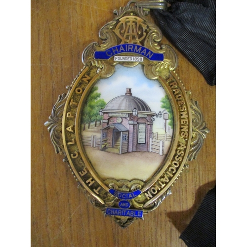 79 - The Clapton Tradesmens' Association Chairman's large silver gilt badge of office with enamelled cent... 