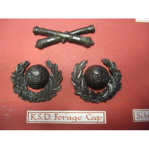 141 - Royal Marine Artillery badge range including officers KSD forage cap, KSD collar badges, gilt collar... 