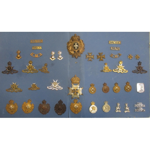 167 - Good Maltese badge and insignia collection (40 items) mounted on card including Royal Malta Artiller... 