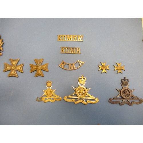 167 - Good Maltese badge and insignia collection (40 items) mounted on card including Royal Malta Artiller... 