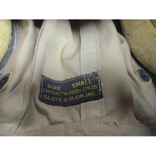 168 - USAAF Air Gunner's head gear displayed on polystyrene head with:
1. Tan cloth flight cap, size small... 