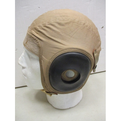 168 - USAAF Air Gunner's head gear displayed on polystyrene head with:
1. Tan cloth flight cap, size small... 