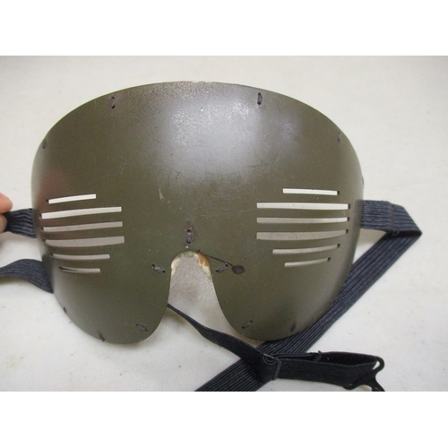 168 - USAAF Air Gunner's head gear displayed on polystyrene head with:
1. Tan cloth flight cap, size small... 