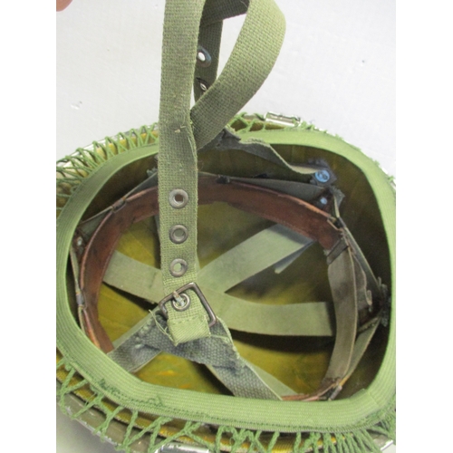 185 - U.S. Paratrooper's M-1 helmet and liner, green textured painted shell, webbing A strap with webbing ... 