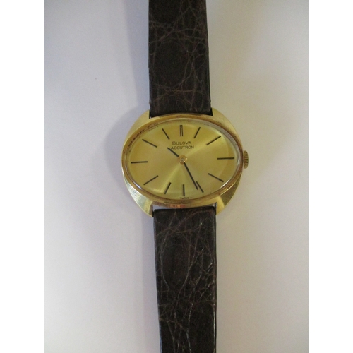 421 - 18ct gold banded wristwatch with plan dial, baton hands, stick indices, plain bezel, reverse  N2 2 6... 