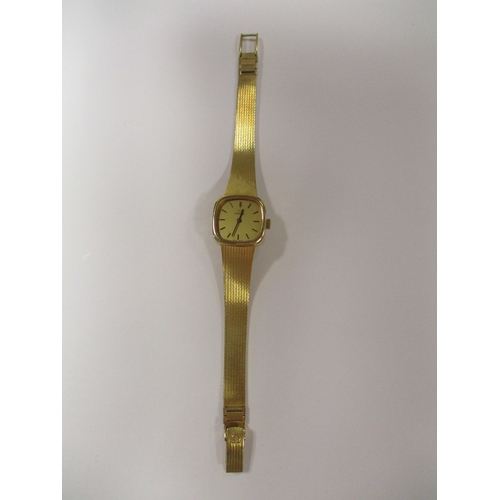 424 - Omega. Bracelet watch, 18ct gold, 'SWISS MADE' with plan dial, baton hands, stick indices, plain bez... 