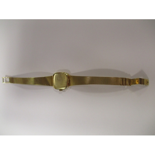 424 - Omega. Bracelet watch, 18ct gold, 'SWISS MADE' with plan dial, baton hands, stick indices, plain bez... 