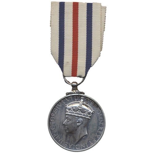 62 - KGVI King's Medal For Service in the Cause of Freedom un-named as issued, some scratching to the edg... 