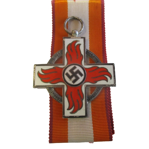 75 - Third Reich. Fire Service medals with:
1. Fire Brigade Honour Cross 2nd Class, some of silvering is ... 