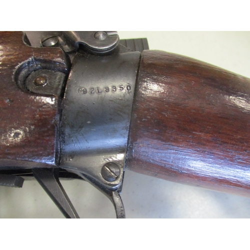 85 - 1950 C No 4 Mk I Long Branch .303 bolt action rifle No 92L8350, Canadian made from dark walnut wood,... 