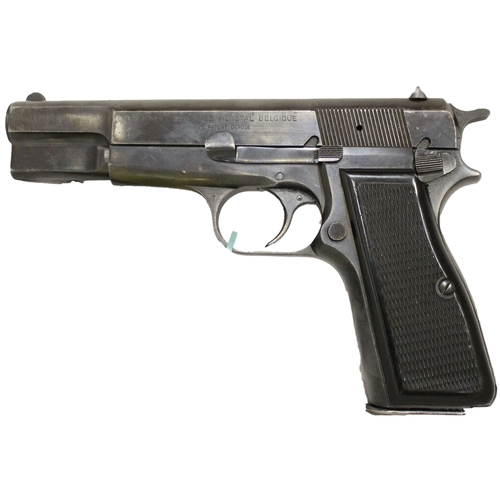 96 - Belgian F.N. 9mm semi-automatic pistol No 76C40234, chequerboard grips, slide stamped Fabrique Natio... 