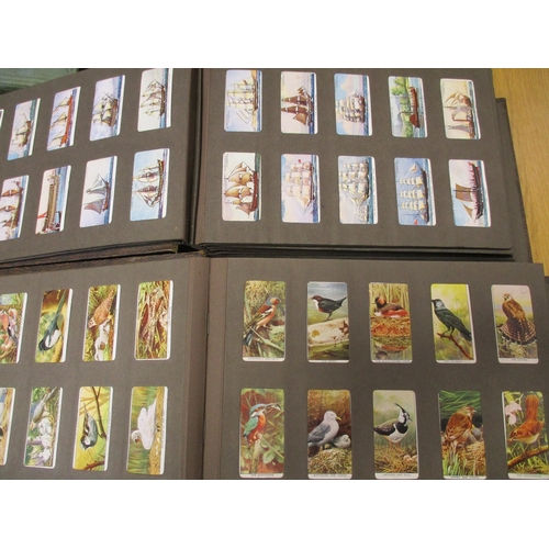 27 - Collection in slot in albums, loose and paper albums with complete sets including Carreras Britains ... 