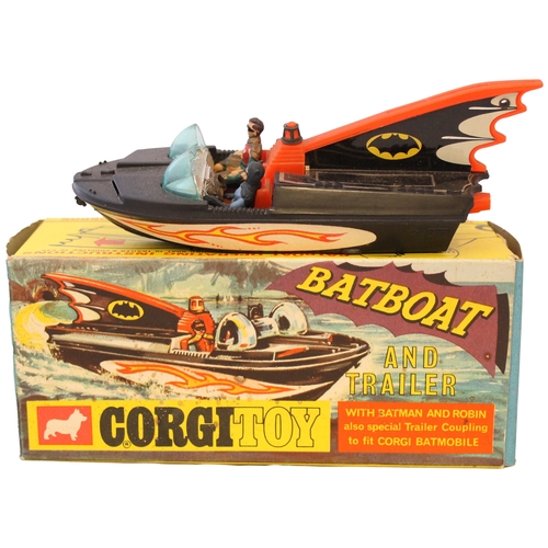 231 - Corgi. Batboat on Trailer No. 107, black plastic boat, tinplate fin cover, Batman and Robin figures,... 