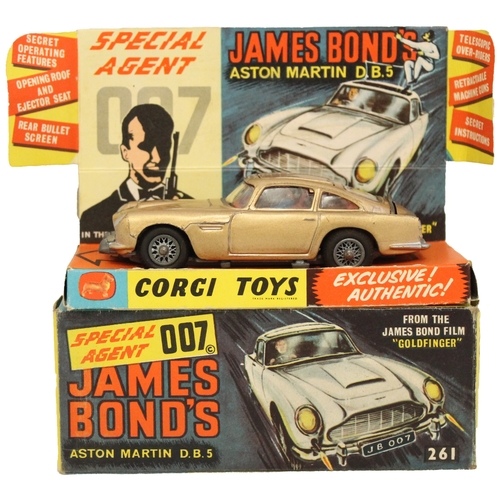 234 - Corgi. James Bond Special Agent 007 'Goldfinger' Aston Martin No. 261, 3 figures, leaflet and specia... 