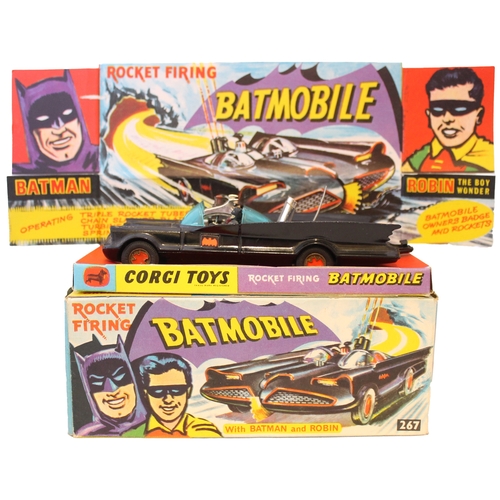 235 - Corgi. Batmobile No. 267, gloss black body, gold sat hubs, Batman and Robin figures, with 9 yellow '... 