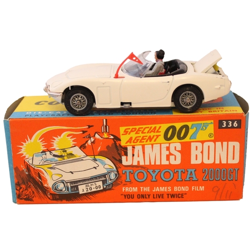 238 - Corgi. James Bond's Toyota 2000 GI No. 336, white body, red aerial, 2 figures, rocket launchers in b... 