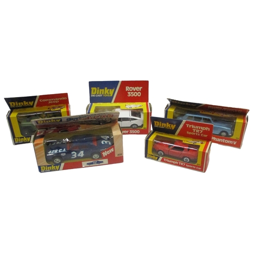 246 - Dinky. Boxed mixed collection of cars, including Sunbeam Alpine Sports No 107, Rover 75 Saloon No 15... 