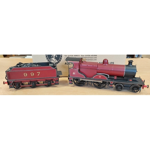 296 - Pair of unboxed O gauge maroon locomotives and tenders generally very good to excellent assembled to... 