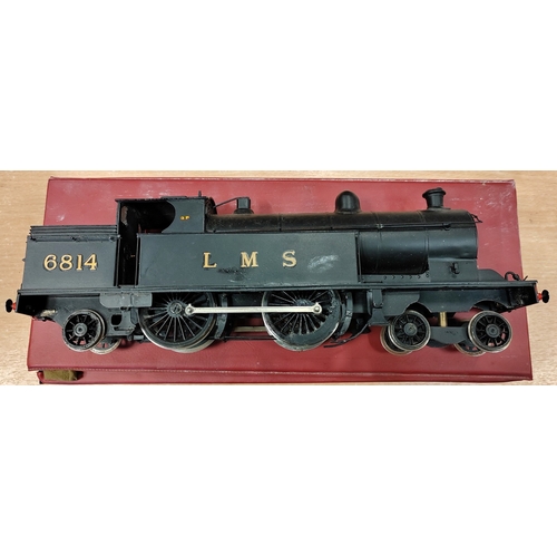 298 - O gauge LMS black 4-4-2 tank locomotive No.6814 generally very good (LMS and number removed on one s... 