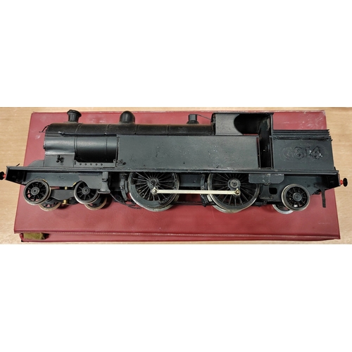 298 - O gauge LMS black 4-4-2 tank locomotive No.6814 generally very good (LMS and number removed on one s... 