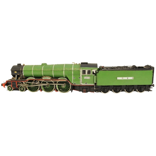 299 - O gauge 4-6-2 LNER 4472 'Flying Scotsman' green locomotive and tender, generally good without box, f... 