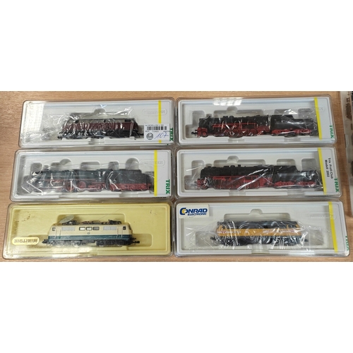 310 - Range of N gauge locomotive and coaches generally excellent to mint in mostly very good cases with M... 