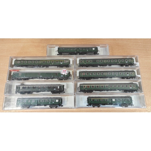 310 - Range of N gauge locomotive and coaches generally excellent to mint in mostly very good cases with M... 