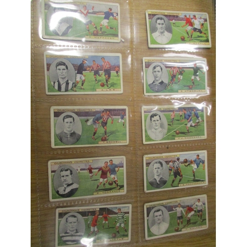 39 - Churchman. Complete set in plastic sleeves with Footballers (brown) generally fair to good. Cat. £2,... 