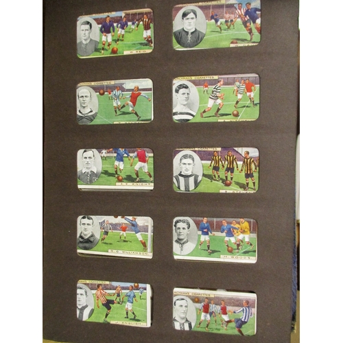 39 - Churchman. Complete set in plastic sleeves with Footballers (brown) generally fair to good. Cat. £2,... 