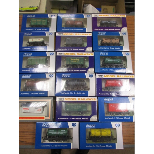 489 - Dapol. Collection of OO gauge wagons generally excellent in excellent boxes. Qty 100 approx. (2B)