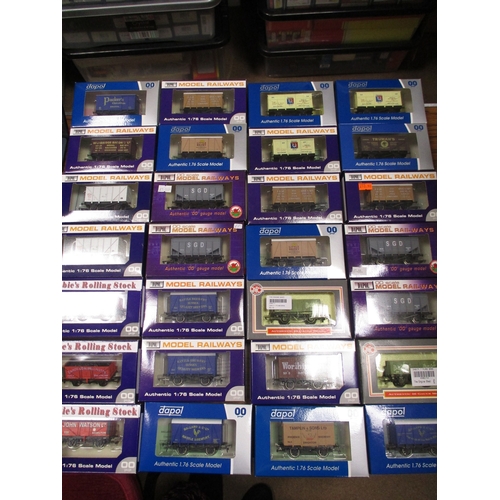 491 - Dapol. Collection of boxed OO gauge wagons, heavy duplication, generally mint in mint boxes. Qty 95 ... 